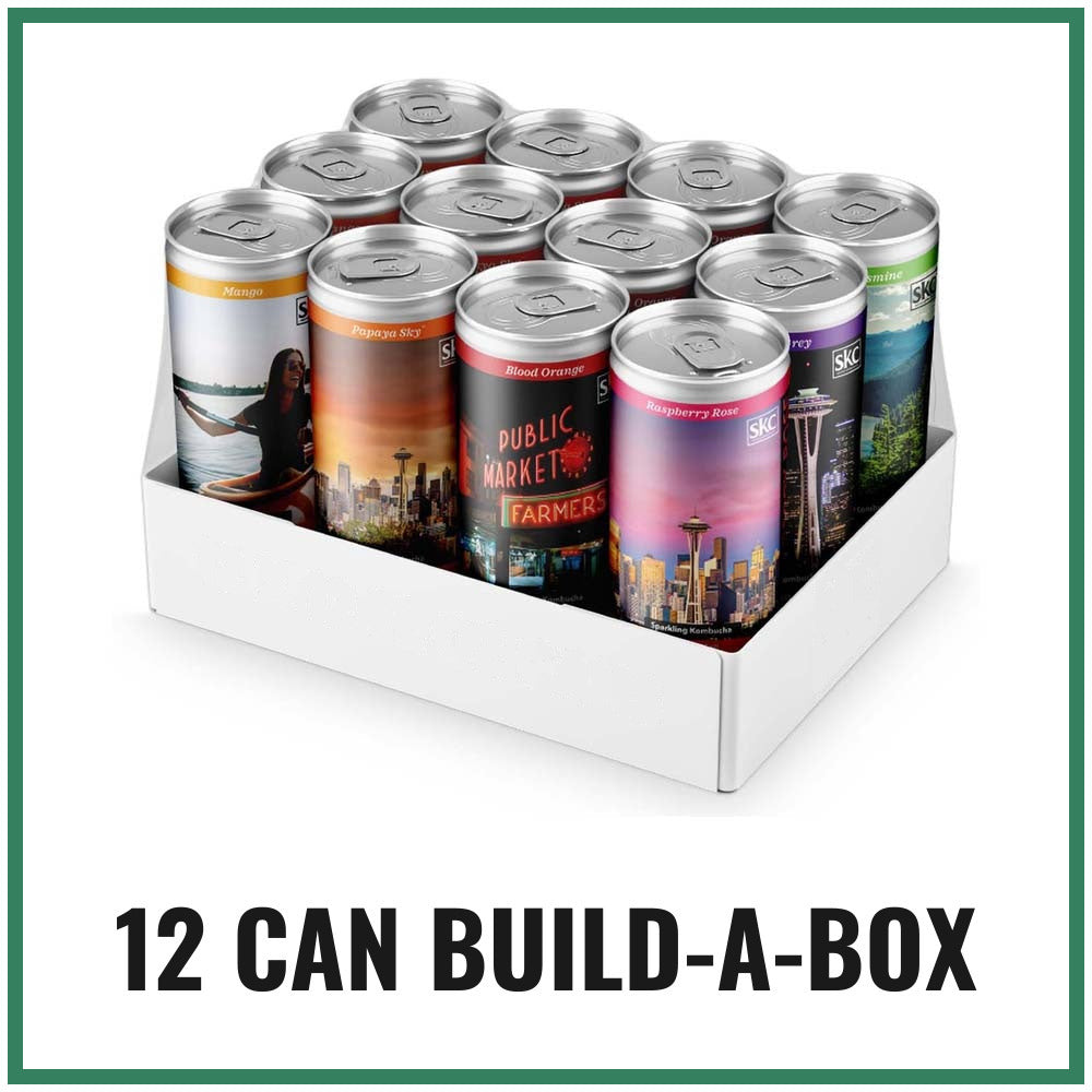 A tray of twelve 12 oz Seattle Kombucha cans in mixed flavors, framed in green
