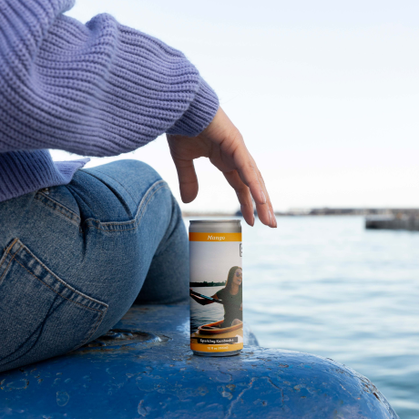 Mango flavored Seattle Kombucha Company 12oz sleek can of local Seattle kombucha